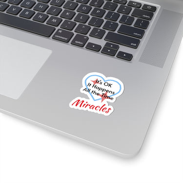 Sheet of 4 vinyl stickers with “Miracles Happen” design, message “It’s OK. It Happens All the Time – Miracles,” glossy finish, faith-based stickers are daily reminders of God’s tangible goodness, 2-inch sticker on laptop